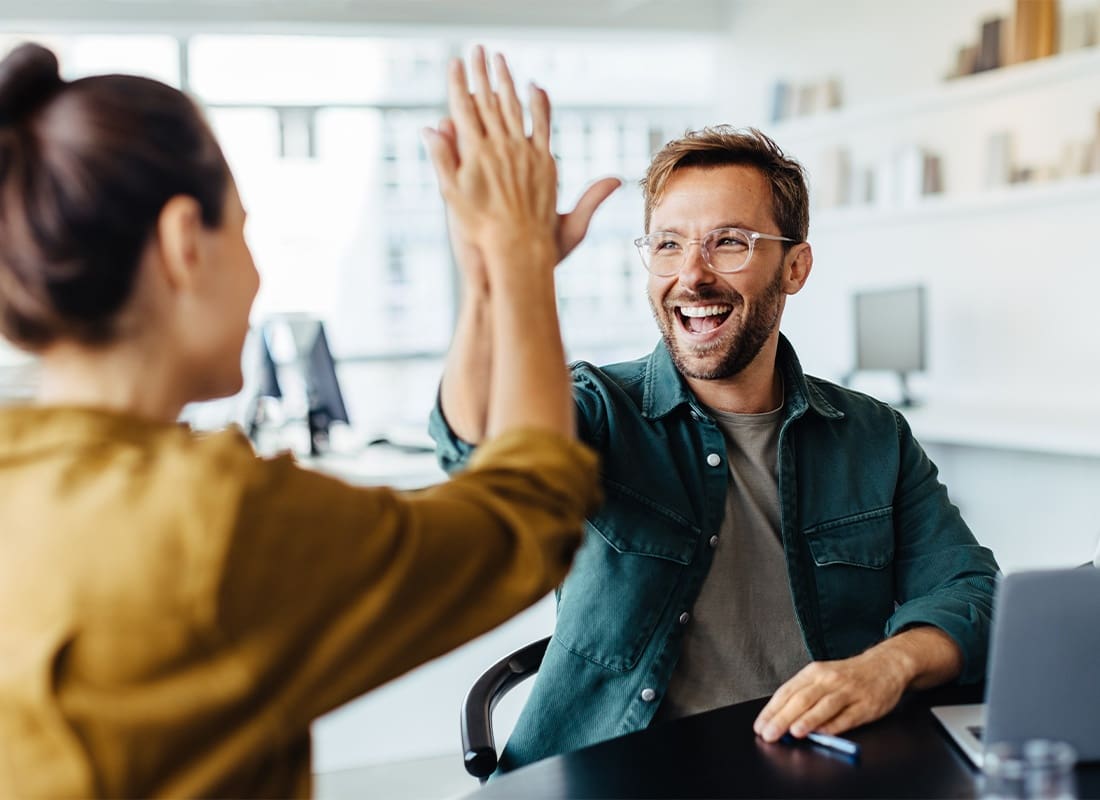 We Are Independent - Business People Celebrating Success in an Office